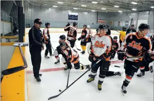  ?? NEWS FILE PHOTO SEAN ROONEY ?? Medicine Hat Cubs head coach JD Gaetan (left) sends players off for another drill during practice Tuesday, Sept. 6, 2016 at the Kinplex. The team has decided to move on without its entire coaching staff from last season.