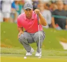  ?? MIKE CARLSON/THE ASSOCIATED PRESS ?? Tiger Woods is near the leader Saturday at the Valspar Championsh­ip in Palm Harbor, Fla.