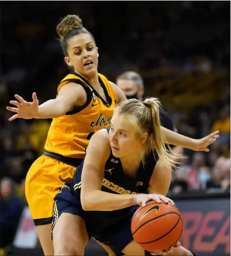  ?? CHARLIE NEIBERGALL — THE ASSOCIATED PRESS ?? Former Michigan guard Maddie Nolan, with ball, now at Colorado, has played against Iowa four times over her collegiate career. The Buffs and Hawkeyes match up Saturday afternoon in Albany, N.Y. for a Sweet 16game.