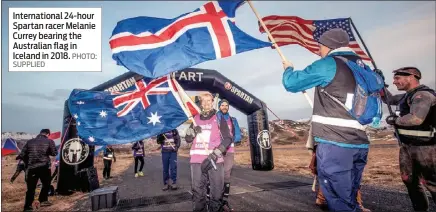  ?? SUPPLIED PHOTO: ?? Internatio­nal 24-hour Spartan racer Melanie Currey bearing the Australian flag in Iceland in 2018.