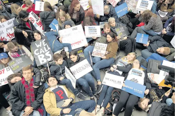  ?? PICTURE: STEFAN ROUSSEAU/PA WIRE ?? Protesters during the London March For Our Lives anti-gun rally outside the US Embassy in London