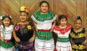  ?? ZACH SRNIS — THE MORNING JOURNAL ?? Isabella Ostolaza, Neveah Hamilton-Morales, Angela Sanchez, Arrayah Craighead, and Eleyna Szakats pose during the Cinco de Mayo Little Queen photo shoot.