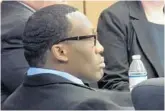  ?? MARC FREEMAN/STAFF ?? Elton Taylor, 39, listens to the prosecutor’s opening statement in his murder trial on Thursday.