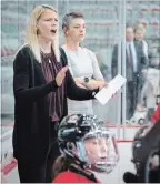  ?? JEFF MCINTOSH THE CANADIAN PRESS ?? Courtney Kessel, a former player on the Canadian women’s hockey team and now an assistant coach of Canada’s under-18 team, coaches an intrasquad game in Calgary on Wednesday.