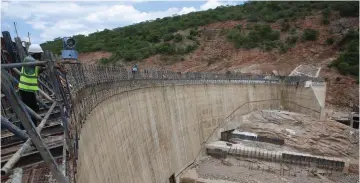  ?? ?? The Lake Gwayi-Shangani dam wall under constructi­on . The project will mainly benefit Bulawayo and Matabelela­nd South in terms of water supply