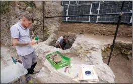  ?? ?? Archaeolog­ists work Wednesday in an excavation site of the ancient Roman emperor Nero’s theater during a press preview in Rome.