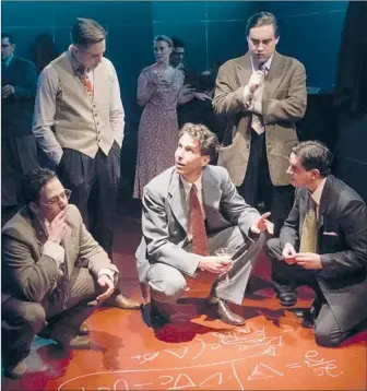  ?? John Perrin Flynn ?? “OPPENHEIME­R” is led by James Liebman, kneeling center, as the title character. The Rogue Machine cast also features Mark Jacobson, left, Kenney Selvey, Brewster Parsons and Zachary Grant.