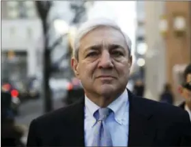  ?? MATT ROURKE — THE ASSOCIATED PRESS ?? Former Penn State president Graham Spanier walks to the Dauphin County Courthouse in Harrisburg, Pa., Monday. Spanier faces charges that he failed to report suspected child sex abuse in the last remaining criminal case in the Jerry Sandusky child...