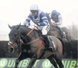  ??  ?? ■ Frodon ridden by Bryony Frost wins the Caspian Caviar Gold Cup Handicap Chase during day two of the Internatio­nal Meeting at Cheltenham Racecourse.