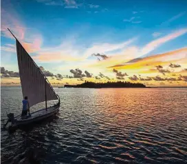  ??  ?? Sail into the sunset on traditiona­l Dhoni at Constance Moofushi Resort.