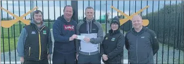  ?? ?? Harry Dore of Castletown, Ballyagran being presented with his Last Man Standing winnings by Frankie Carroll in the presence of Donie Ryan, Sherry Ryan and John Burke.