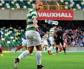  ??  ?? Showing bottle: Celtic’s Leigh Griffiths