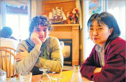  ?? ZHISHUN XU/SPECIAL TO THE GUARDIAN ?? Karim ELHossini, left, 23, from Egypt, is in his final year of a bachelor of business administra­tion degree at UPEI, while Xinyue Li, 27, of China, is in her second year of her master of education in leadership and learning at the university.
