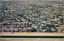  ?? RJ SANGOSTI — THE DENVER POST ?? The Central Arizona Project is shown in October 2022carryi­ng Colorado River water outside suburbs in Phoenix, Ariz.