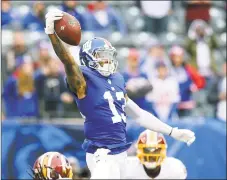  ?? Brad Penner / Associated Press ?? New York Giants general manager Dave Gettleman broke his silence on the trade of wide receiver Odell Beckham Jr. (13) on Monday.