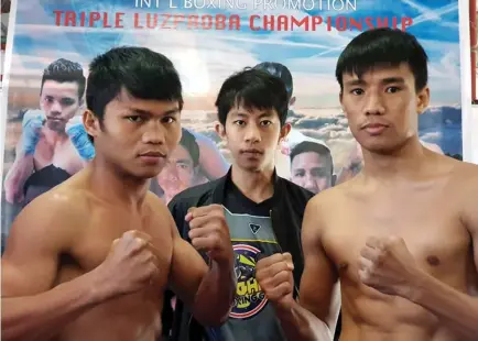  ?? Contibuted photo ?? ALL SET. Ivor Lastrilla of Highland Boxing Gym and Dan Manosa (Metro Manila) face off for the LUZPROBA lightweigh­t title during their weigh – in Monday morning. With them is boxing promoter Darwin Miller Dep-ay.