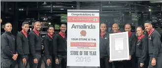  ?? Picture: SUPPLIED ?? STANDING TALL: Amalinda SuperSpar staff are proud of their achievemen­ts which led to their being voted the province’s best SuperSpar for 2015