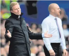  ??  ?? Hard times: Ronald Koeman watched Everton lose to Sean Dyche’s Burnley