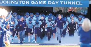  ?? JASON HIRSCHFELD | THE VIRGINIAN-PILOT ?? Old Dominion head coach Ricky Rahne leads his team out of the tunnel before last Saturday’s game against Florida Atlantic.