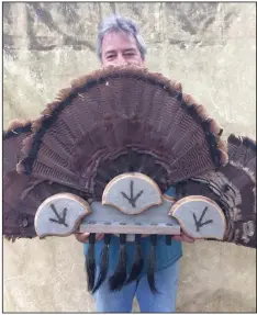  ?? (Arkansas Democrat-Gazette) ?? Turkey kits allow for mounting one fan and beard, or multiples. The quality of the mount depends on the care devoted to preparatio­n.