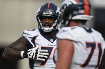  ?? Aaron Ontiveroz ?? Broncos’ right guard Bobby Massie, left, and Austin Schlottman­n drill during training camp on Aug. 19.