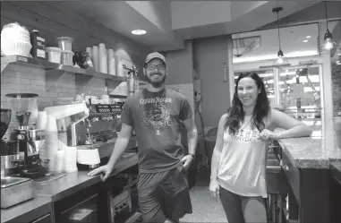  ?? BEA AHBECK/NEWS-SENTINEL ?? Mokelumne Brew House co-owners Kevin Clark and Emily Fulton on Thursday at their School Street location. The coffee and brewhouse is replacing School Grounds, which closed in June.