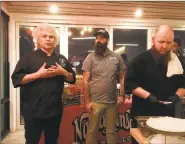  ?? Joe Amarante / Hearst Connecticu­t Media ?? Narraganse­tt’s B.J. Mansuetti, center, with Shell &amp; Bones chef Arturo Franco-Camacho, left, and Shell &amp; Bones staffer Matt Williams shucking oysters with an oyster knife from R. Murphy Knives, right.