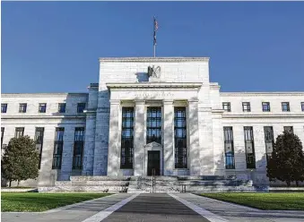  ?? J. Scott Applewhite / Associated Press ?? Central bank officials meeting this week at the Federal Reserve likely will underscore the Fed’s commitment to its low-interest rate policies, even as the economy recovers further.