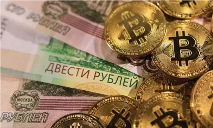  ?? Dado Ruvić/Reuters ?? Vladimir Putin might row back on Russia’s planned embargo of cryptocurr­encies such as bitcoin given western sanctions. Photograph: