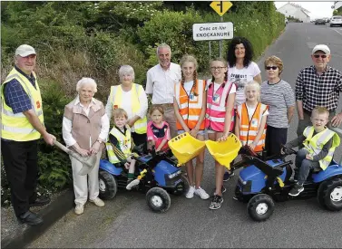  ?? Photo by John Stack ?? Knockanure Tidy Towns Committee making sure everything is spick and span before the judging for this year’s Tidy Towns competitio­n. From left: Willie Joe Leahy, Mary O Carroll, Liam Kearney, Eileen Leahy, Aideen Kearney, John Looney, Alice McMahon,...
