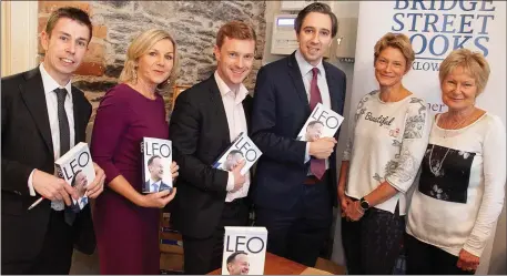  ??  ?? Niall O’Connor (left) with Eileen Whelan, Philip Ryan, Minister Simon Harris and Joanna and Hilary Hamilton at the launch of Niall and Philip’s book ‘Leo Varakdar: A Very Modern Taoiseach’ in Bridge Street Books on Thursday.
