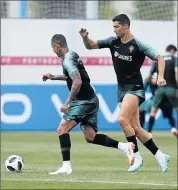  ?? Picture: REUTERS ?? THE STAR MEN: Cristiano Ronaldo, right, and Ricardo Quaresma training yesterday in Kratovo, Russia