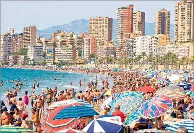  ??  ?? The high-rise hotels are not just a feature of Benidorm but a monument to the cultural impact of the resort