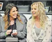  ?? Allen Berezovsky Getty Images ?? LAKERS controllin­g owner Jeanie Buss, right, with Linda Rambis, a front office executive and longtime close friend who has been involved in key decisions.