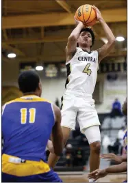  ?? (Arkansas Democrat-Gazette/Justin Cunningham) ?? Little Rock Central guard Bryson Warren (4) averaged 29 points per game against North Little Rock this season. He had 30 in the Tigers’ 75-67 victory over the Charging Wildcats on Feb. 2.