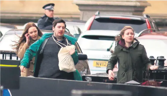  ?? Picture: AFP ?? FEAR. People leave after being evacuated from the Houses of Parliament in London yesterday after an apparent terror attack.