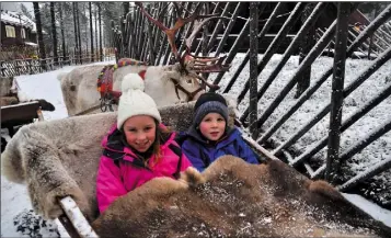  ??  ?? Vivienne and Nathan Moran from Glynn on their visit to Lapland.