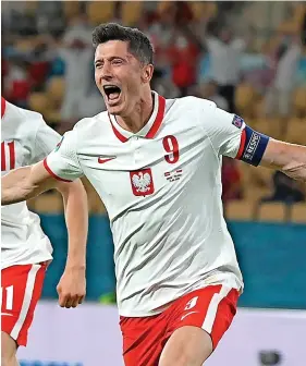  ?? Picture: David Ramos/Getty ?? Robert Lewandowsk­i celebrates scoring for Poland against Spain in this summer’s European Championsh­ips