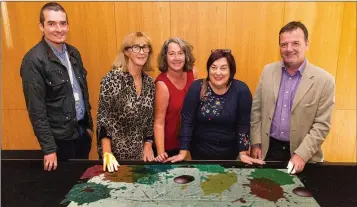  ??  ?? Wicklow County Council staff members Colin Heslin, Claire Fullam, Richella Wood, Margaret Birchall and County Librarian Brendan Martin at the launch of a dementia table in Dun Laoghaire recently.