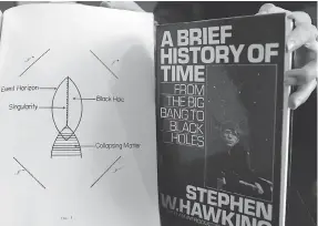  ?? FRANK AUGSTEIN/ THE ASSOCIATED PRESS ?? A signed copy of A Brief History of Time will be among the items available at auction.