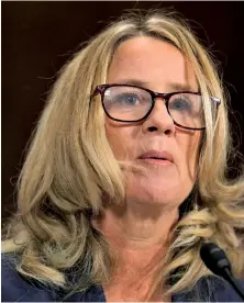  ?? POOL IMAGE VIA AP ?? HEARING HAVOC: Christine Blasey Ford speaks Thursday at a hearing of the Senate Judiciary Committee.