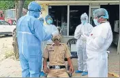  ?? BHARAT BHUSHAN/HT ?? Health workers collect swab samples of officials at the fire brigade office in Patiala on Saturday.