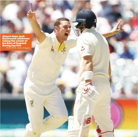  ?? PICTURES: Getty Images ?? Almost done: Josh Hazlewood celebrates taking the wicket of Joe Root of England during day five