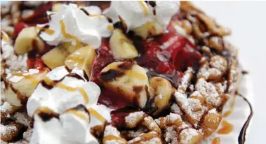  ?? Melissa Phillip / Houston Chronicle ?? Funnel cake by Sills Funnel Cakes