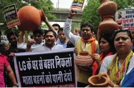  ??  ?? BJP workers protest against water crisis outside L- G house in New Delhi on Tuesday.