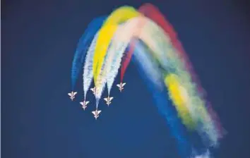  ?? Courtesy: PAF ?? Aircraft of the Chinese aerobatic team Ba Yi fly in formation during the air show hosted by Pakistan’s air force at Samungli airbase.