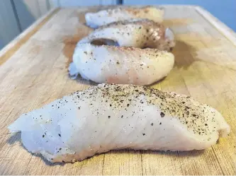  ?? ERIN SULLEY PHOTO ?? You need nothing more than a sprinkle of salt and pepper on freshly caught cod. Delish.