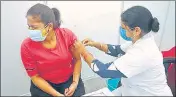  ?? DEEPAK GUPTA/HT PHOTO ?? A family member of LDA staff being vaccinated at LDA office in Gomti Nagar, Lucknow, on Monday.