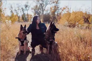  ?? SUBMITTED PHOTO ?? Lisa Krieger, owner of Southern Alberta K9 First Aid, with her two therapy dogs.
