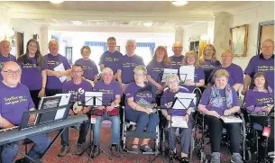  ??  ?? May Parkington, second lady from the left in the front row, with the Stroke Associatio­n choir